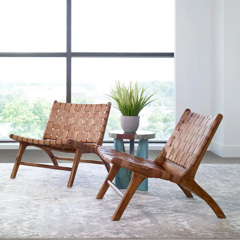 Poltrona decorativa in vera pelle intrecciata a mano con struttura in legno massello per soggiorno